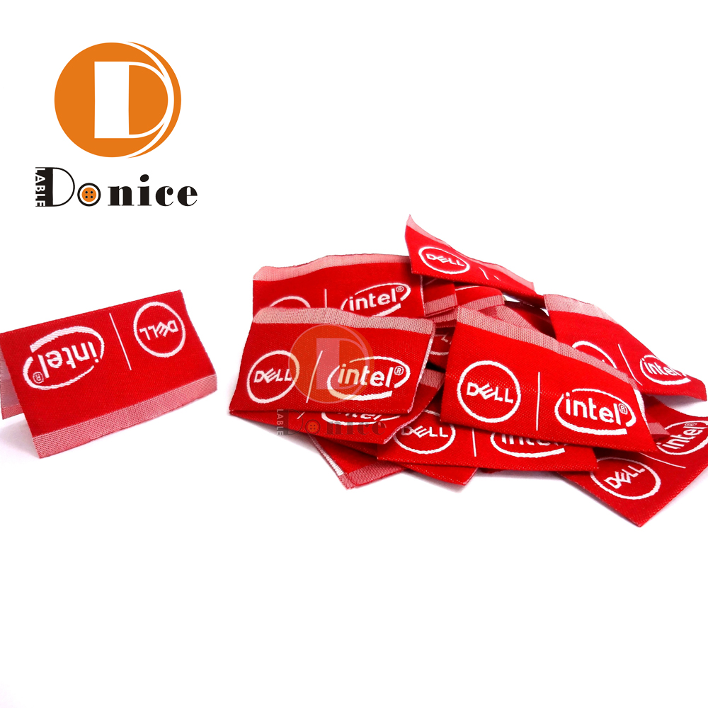 Custom woven labels with holographic elements