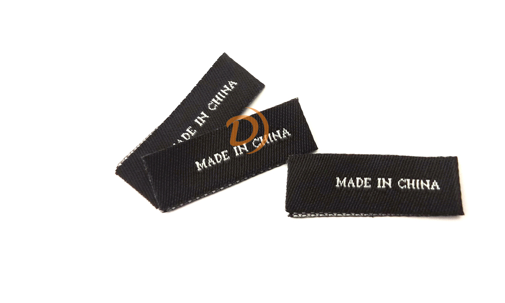 Custom woven labels for outerwear and jackets Custom woven labels for outerwear and jackets